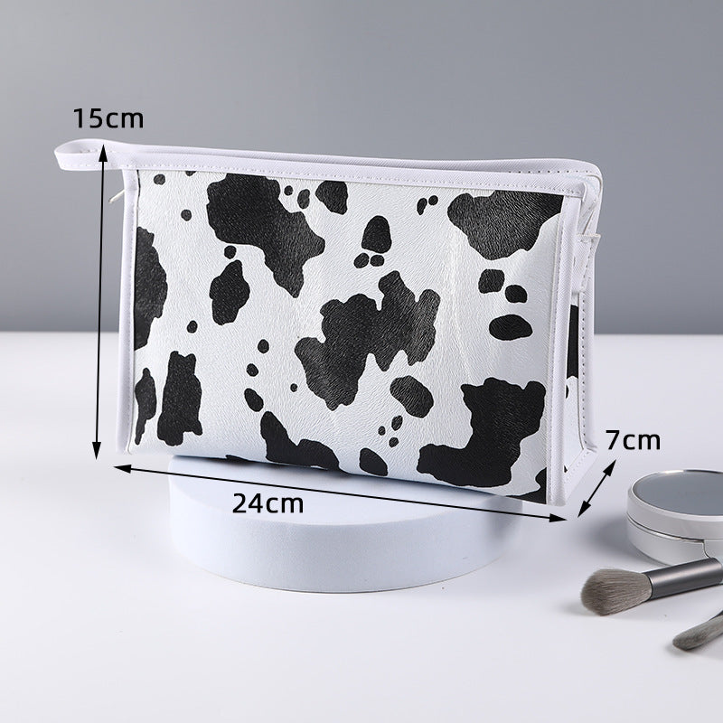 Cow print anti-makeup bag Large capacity portable toiletries bag Portable travel bag Toiletries storage bag