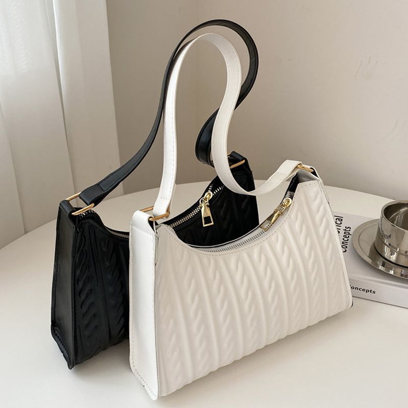 Summer tide texture armpit baguette bag female bag new style all all design hand bill of lading shoulder bag female